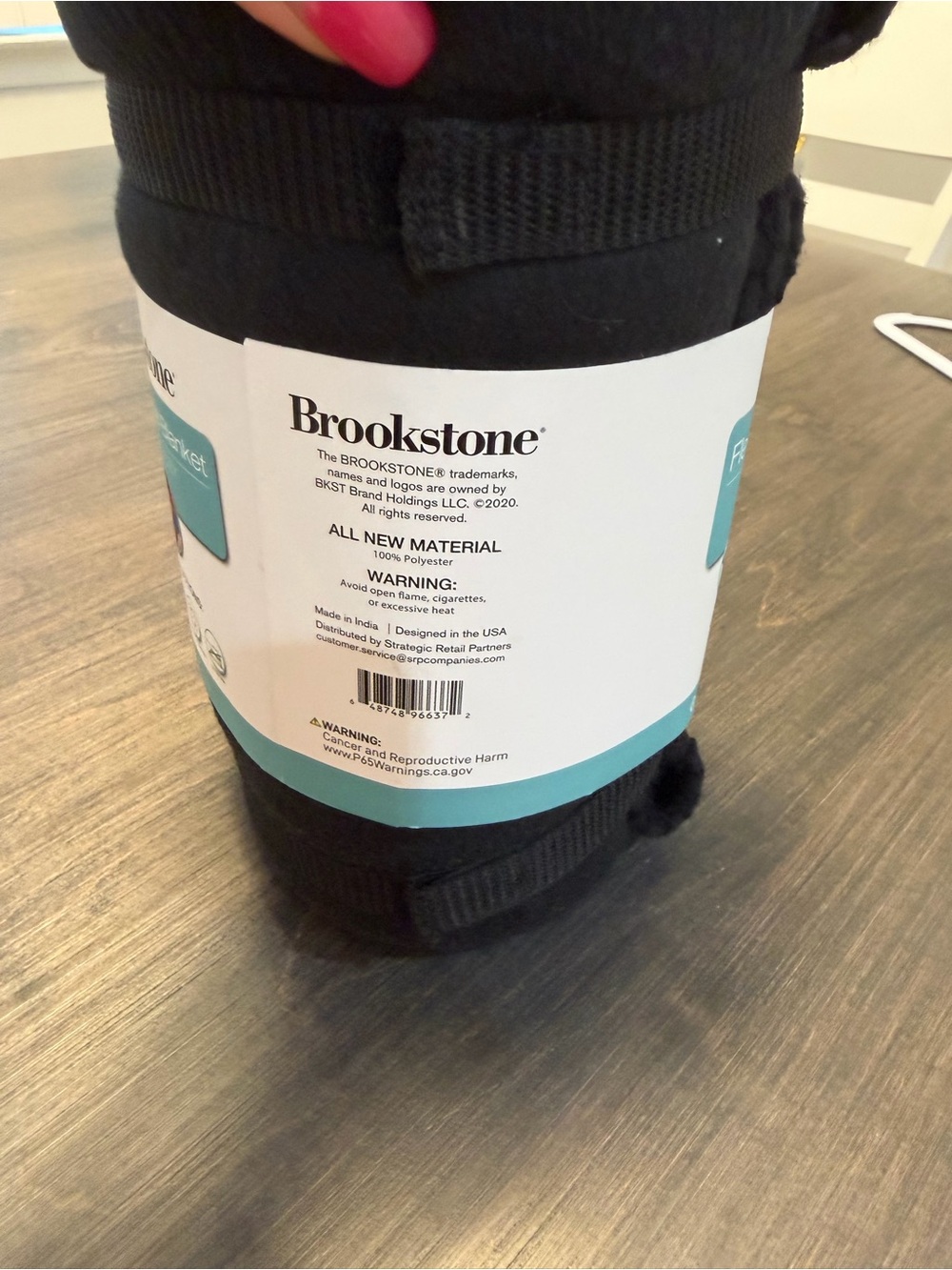 Brookstone Black Fleece Travel Blanket with Carry Strap - Picture 2 of 5